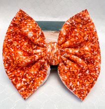 Load image into Gallery viewer, Faux Orange Glitter Bow